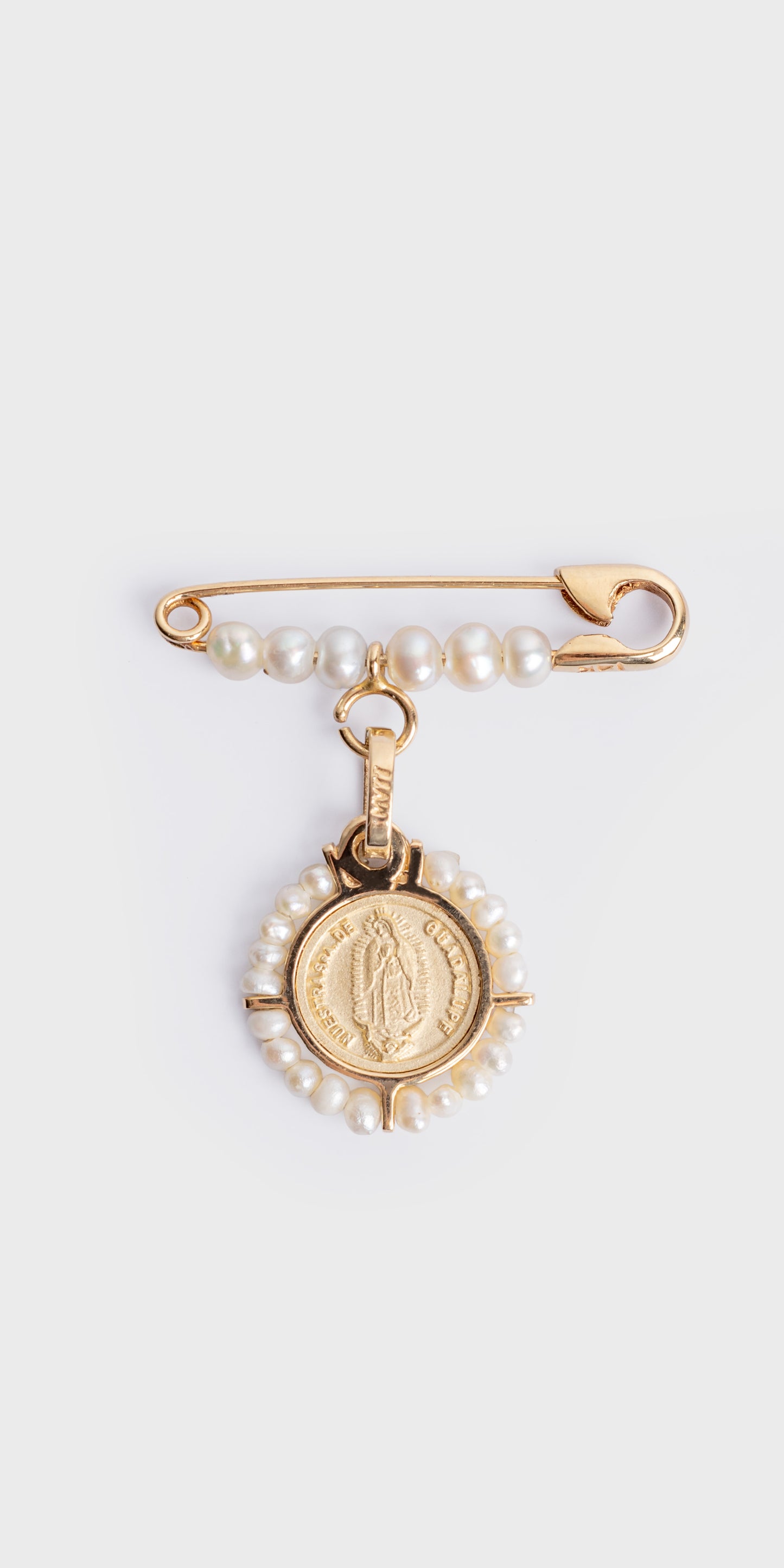 10k Solid Gold Safety Pin with a row of natural pearls