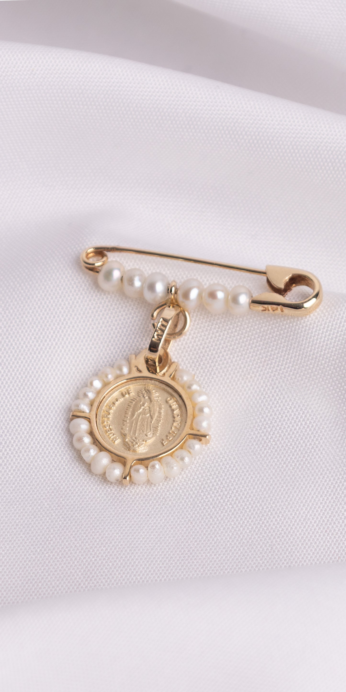 10k Solid Gold Safety Pin with a row of natural pearls